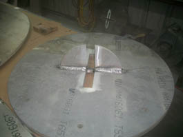 Base plate with stiffener plates welded in place